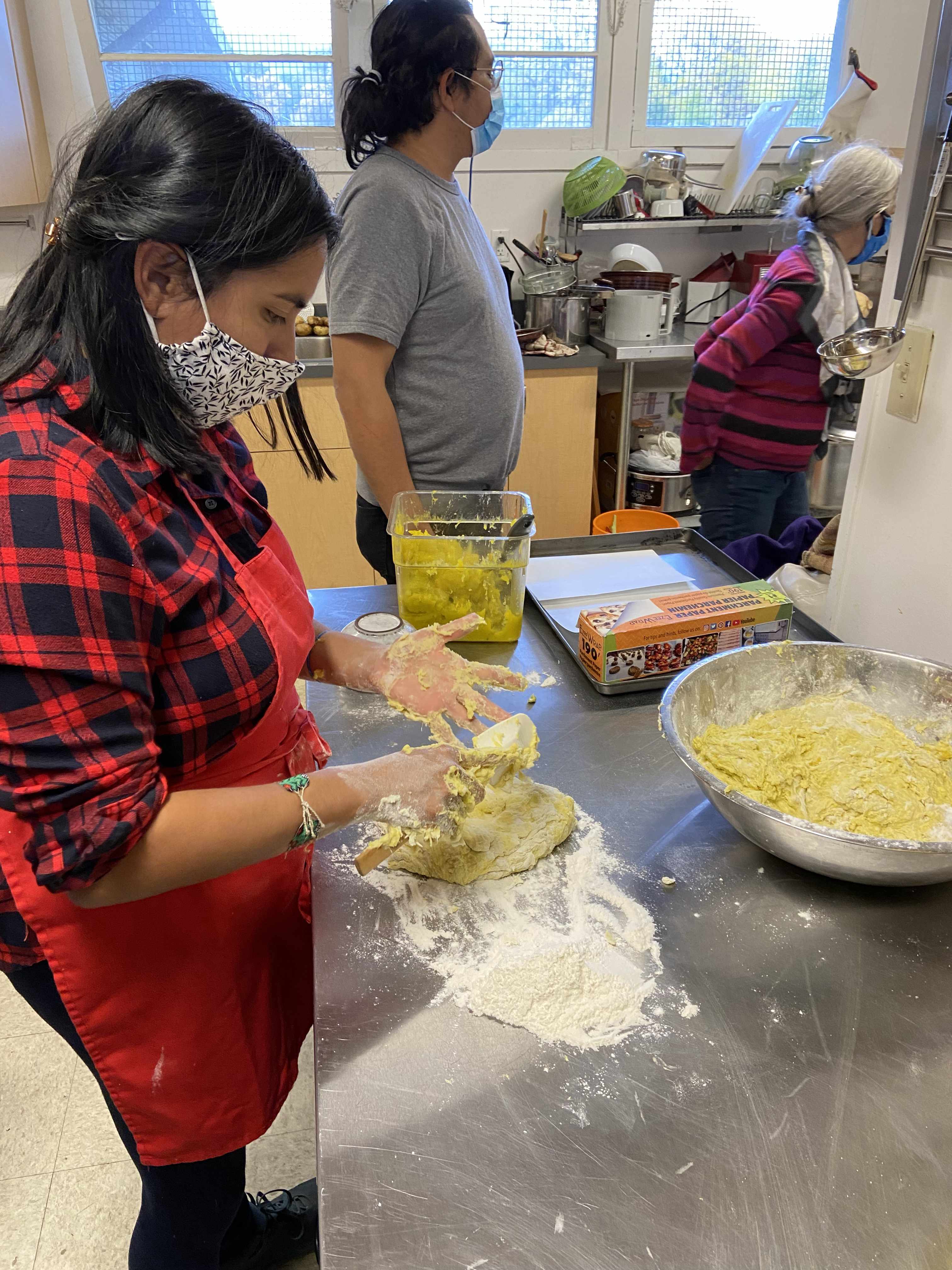 Ingrid kneeding the squash bannok mixture